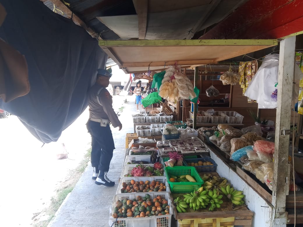 Polsek Bulik Sambangi Pasar Tradisional, Sampaikan Imbauan Kamtibmas kepada Masyarakat