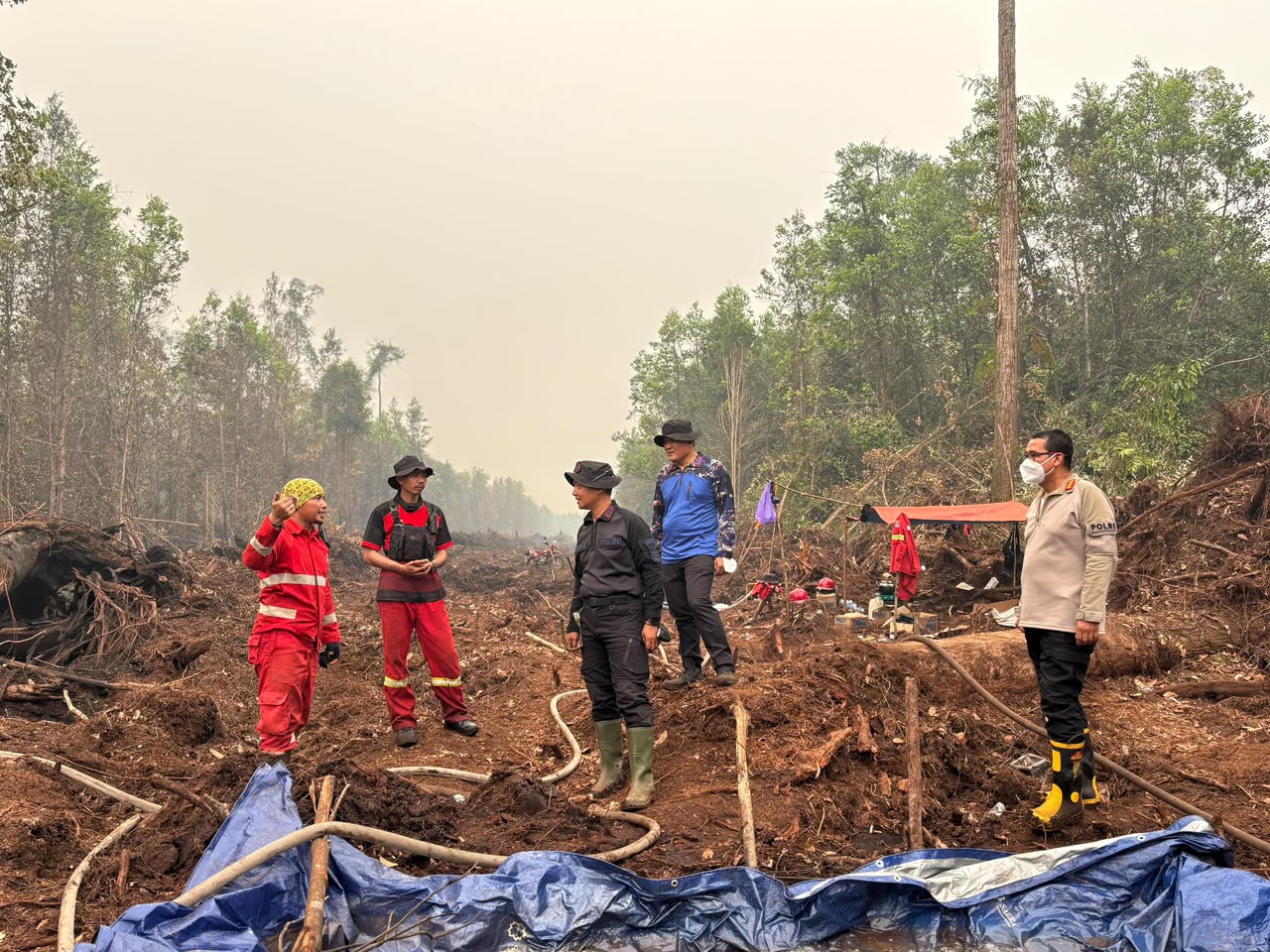 Dirpolairud Polda Kalteng Dampingi Kapolda dalam Penanggulangan Karhutla di Kanal Acio dan Posko Taruna, Jl Trans- kalimantan kec Jabiren Kab Pulang pisau.